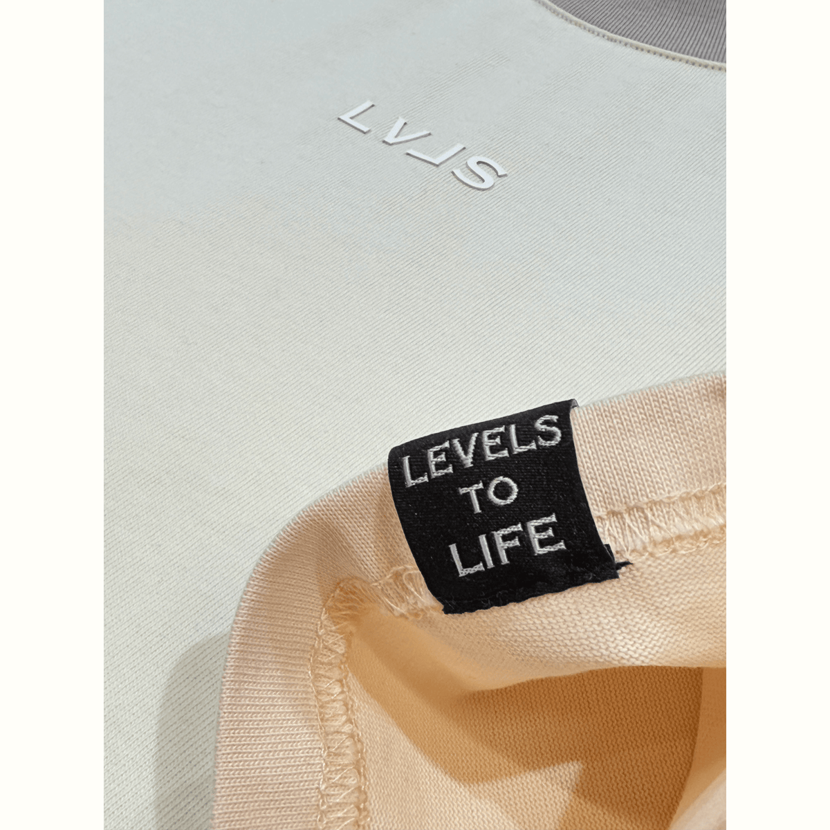 LEVELS, LLC OVERSIZE TEE LEVELS SIGNATURE OVERSIZED TEE | CREAM DE LA CREME